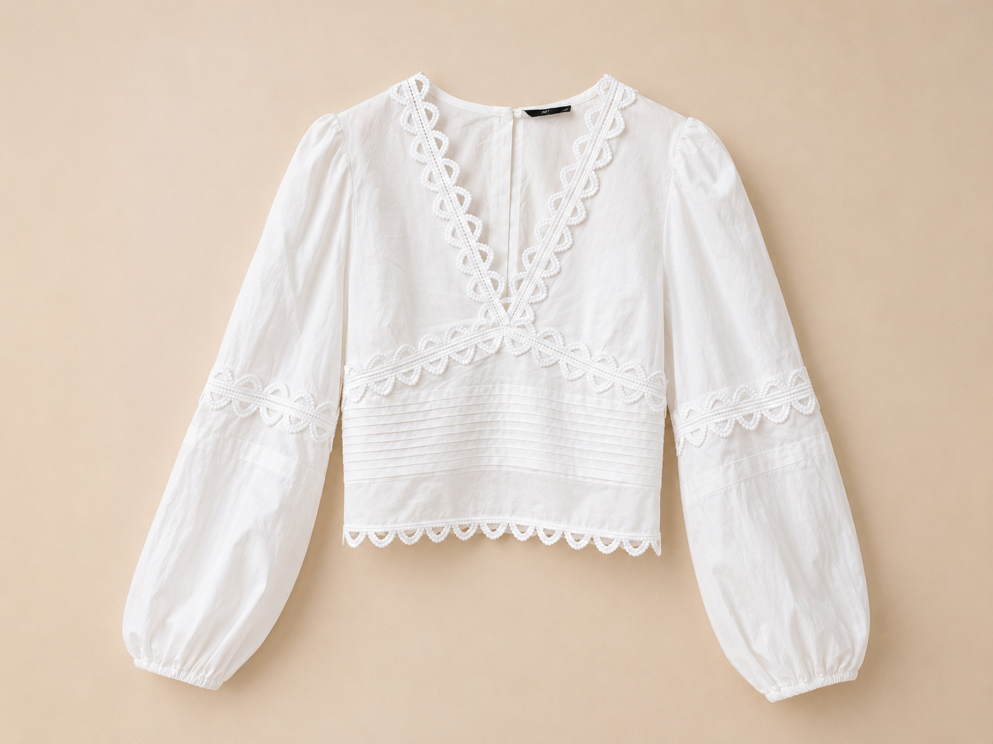 Witte blouse | open rug met striksluiting