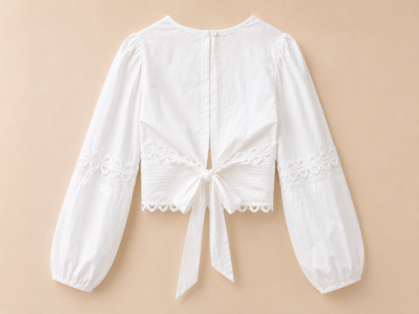 Witte blouse | open rug met striksluiting